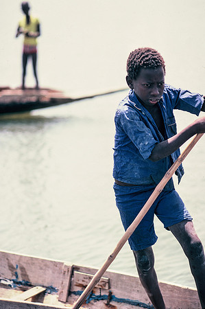 Boys in pirogues, Saloum Delta
